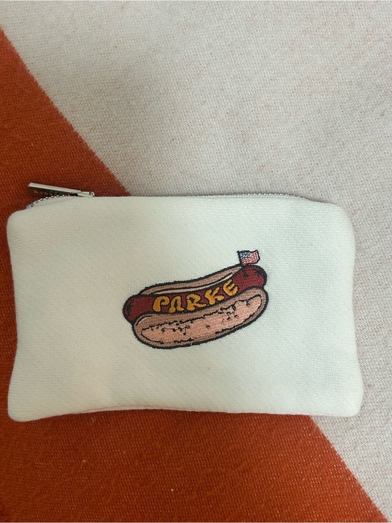 Parke Handbags - PARKE never used White Pouch with Hot Dog Patch